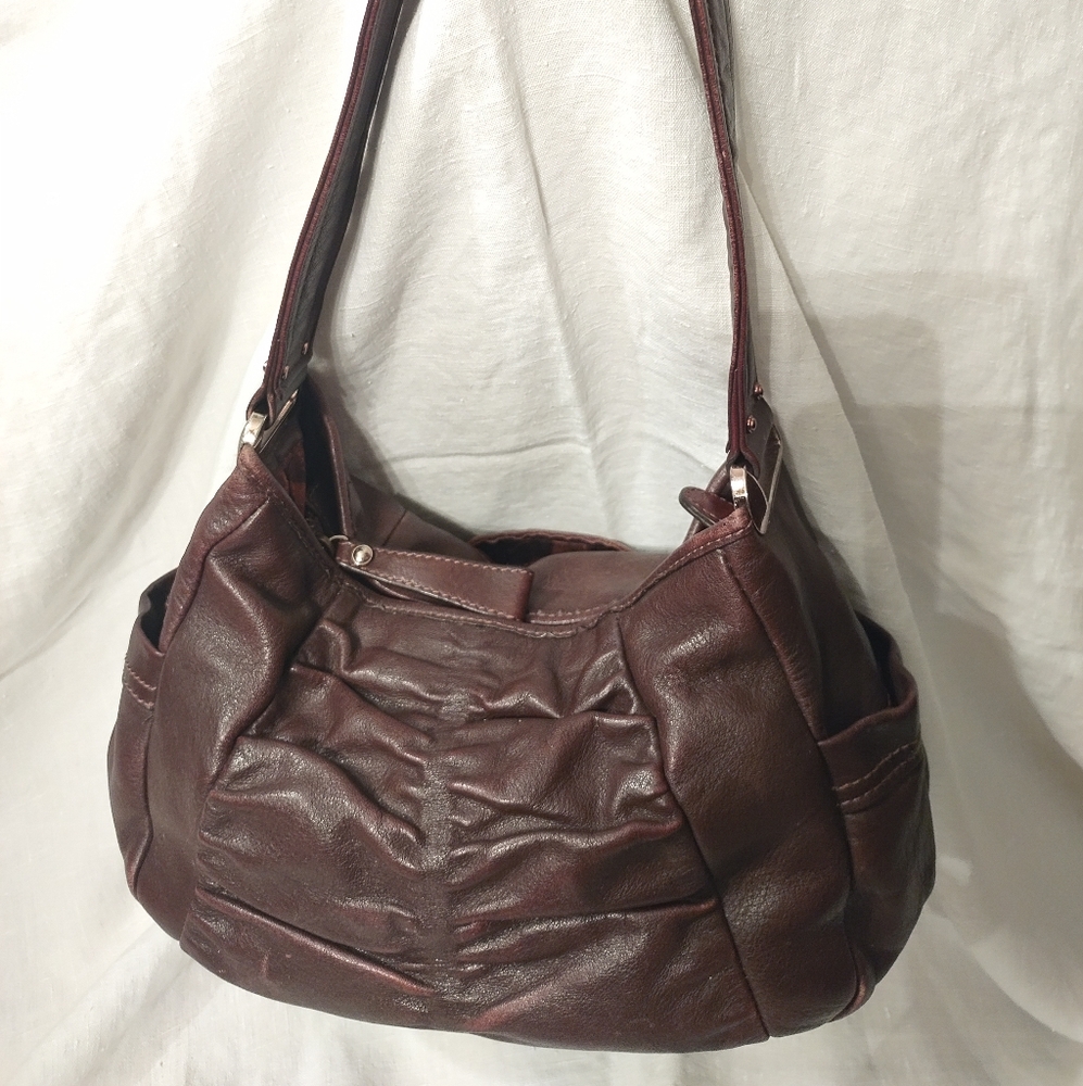 Vintage B. Makowsky brown leather bag.